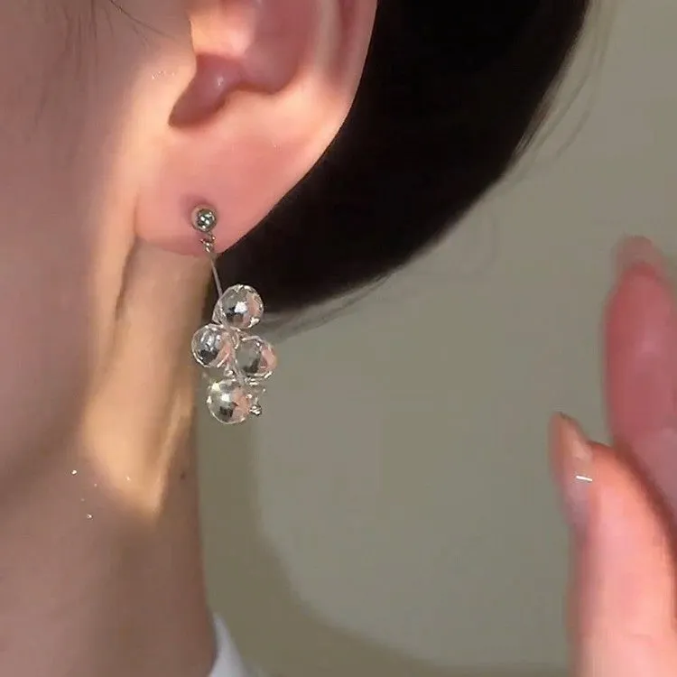 Silver needle simple crystal tassel earrings with geometric round shape in silver finish