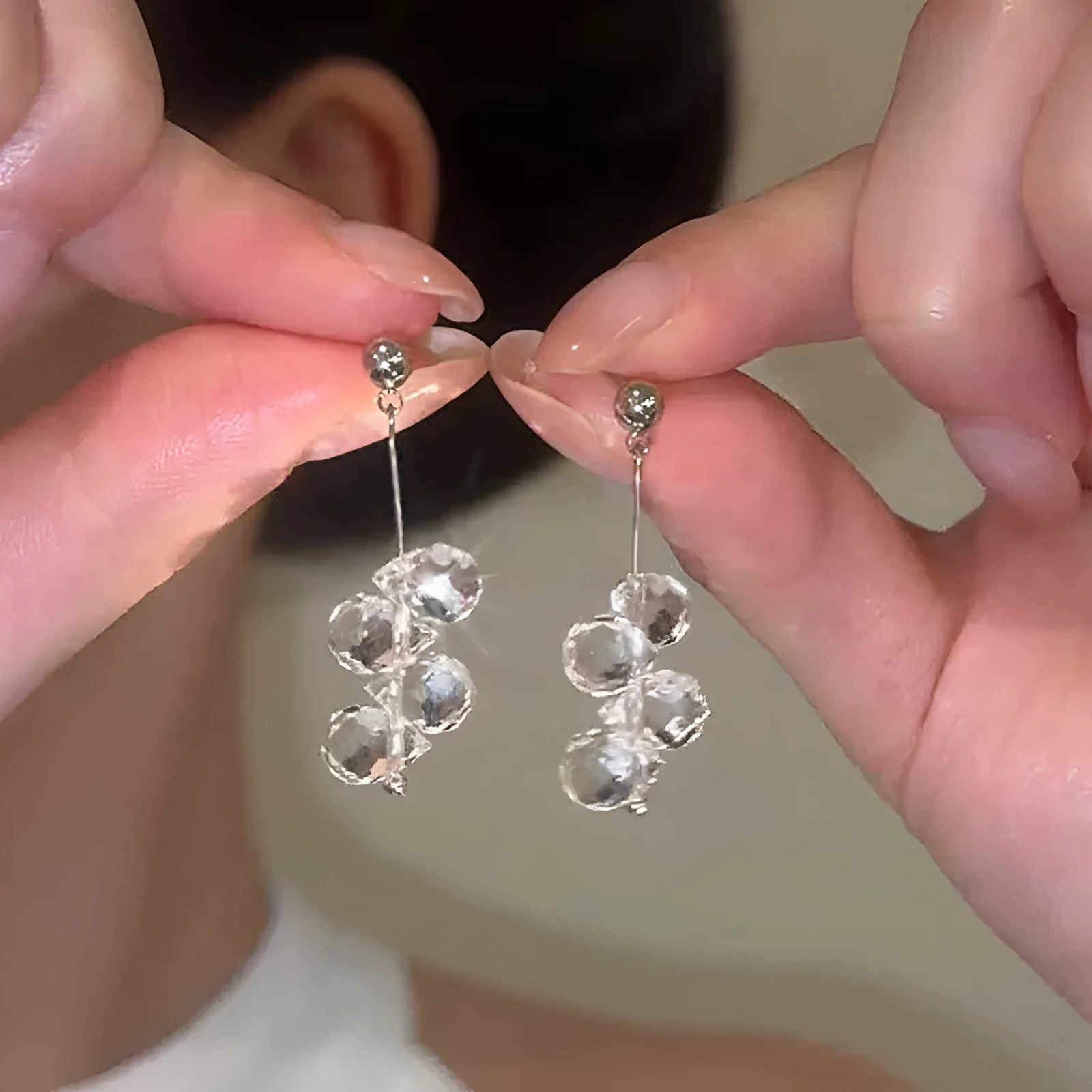 Silver needle simple crystal tassel earrings with geometric round shape in silver finish