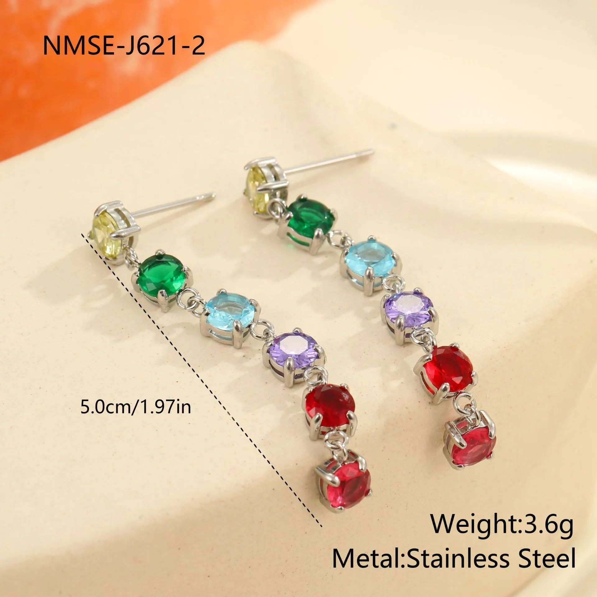 Gold-finish stainless steel earrings with inlaid colour zircon in geometric round and diamond pattern