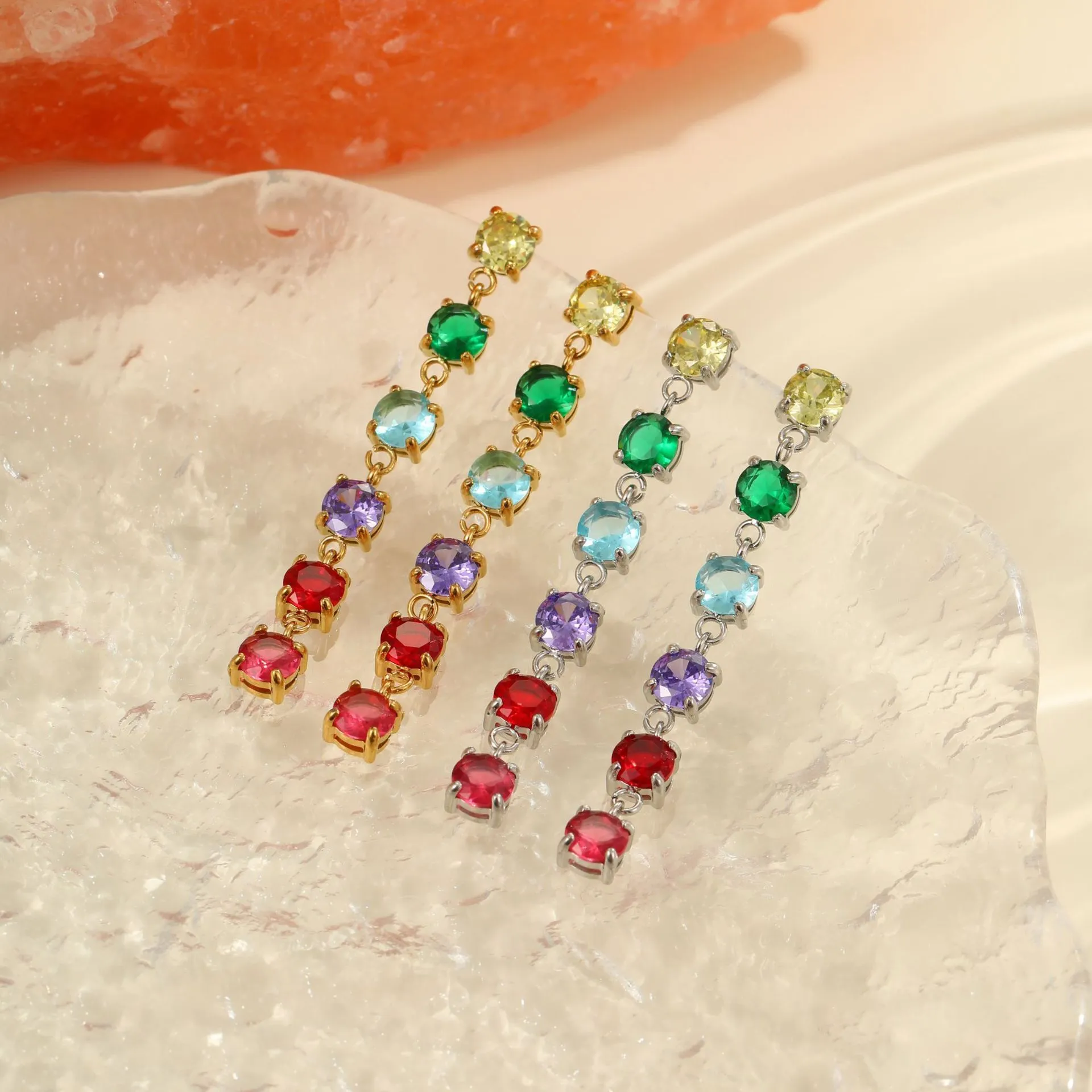 Gold-finish stainless steel earrings with inlaid colour zircon in geometric round and diamond pattern