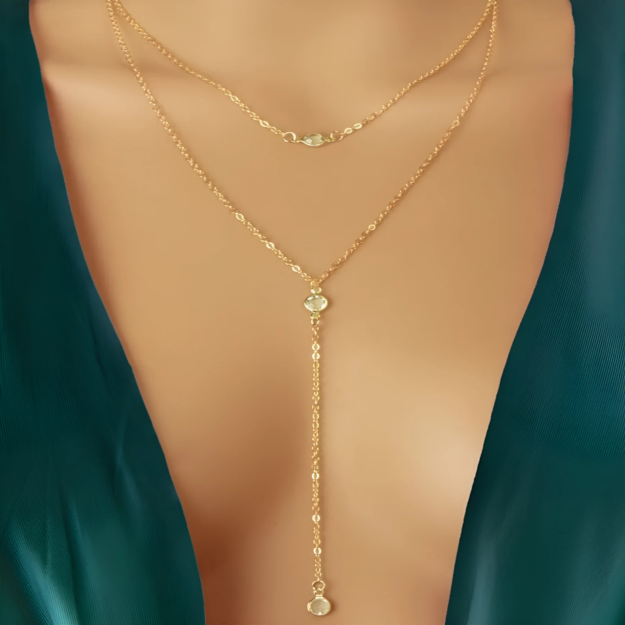 Alloy geometric pendant necklace with electroplated gold finish and O-ring chain on woman