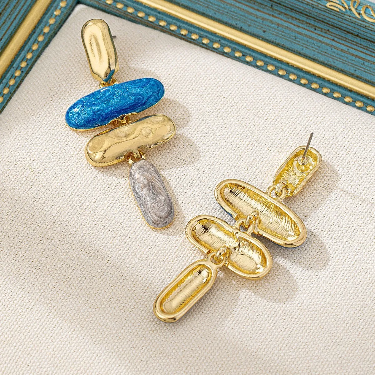 Geometric zinc alloy stud earrings with electroplated finish in multiple colours