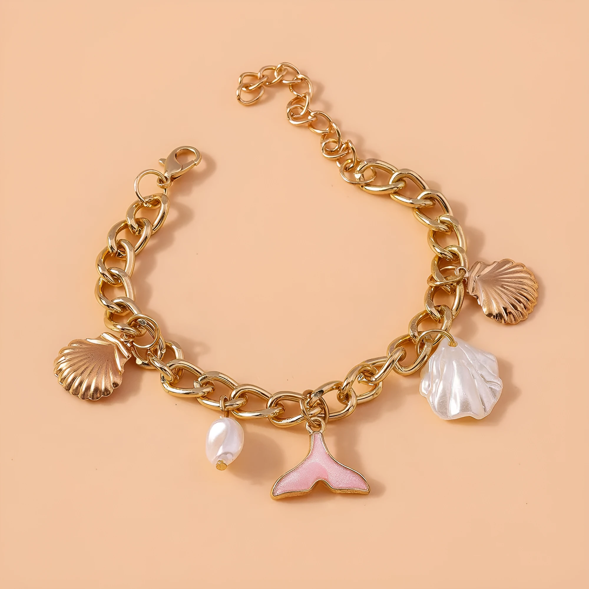 Women's shell pearl mermaid tail bracelet in white pearl alloy finish