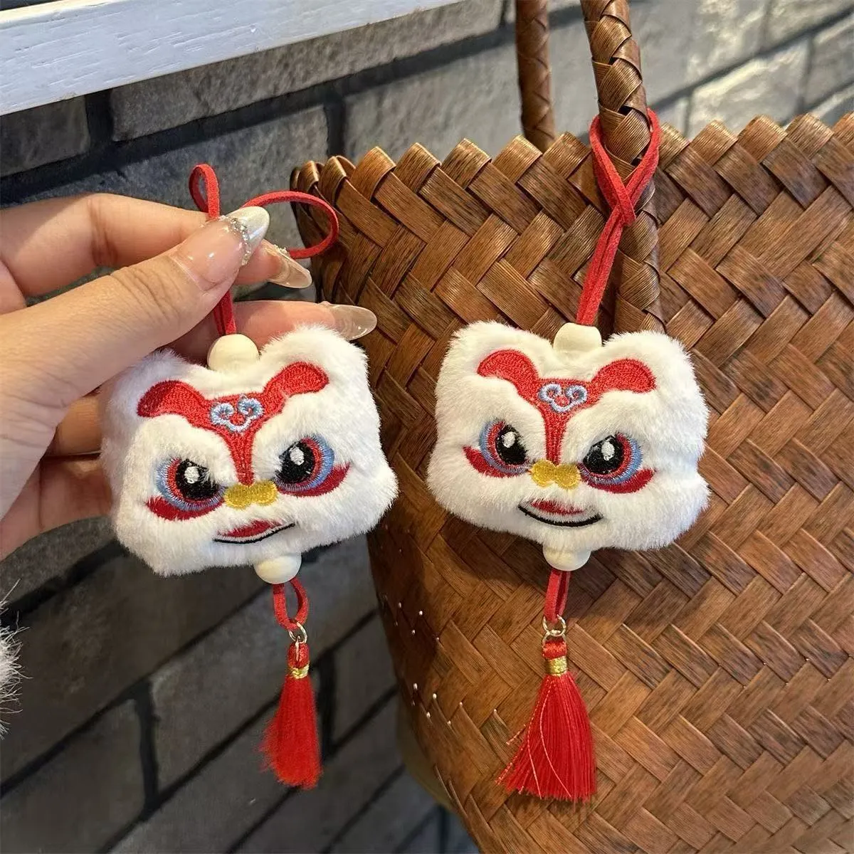 Chinese style plush lion keychain ornament with star stone detail in blue colour