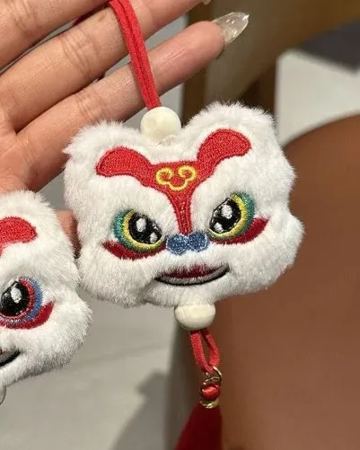 Chinese style plush lion keychain ornament with star stone detail in blue colour