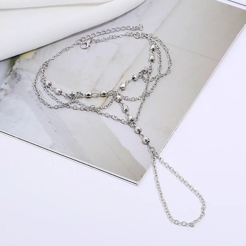 Women's alloy anklet in gold and silver with U-shaped design for beach travel