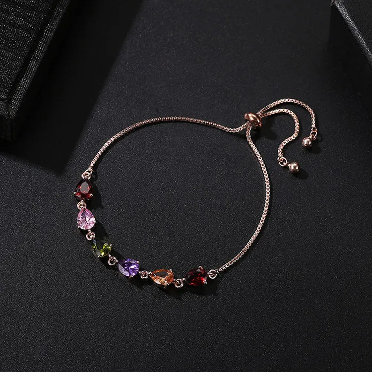 Copper geometric bracelet with inlaid zircon and glass stones for women in water drop diamond shape