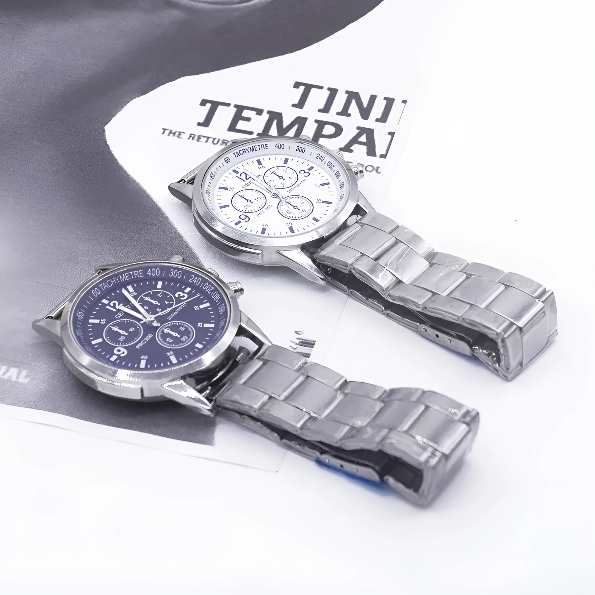Men's quartz wrist watch set with round alloy dial, black face, and stainless steel buckle on a plain background