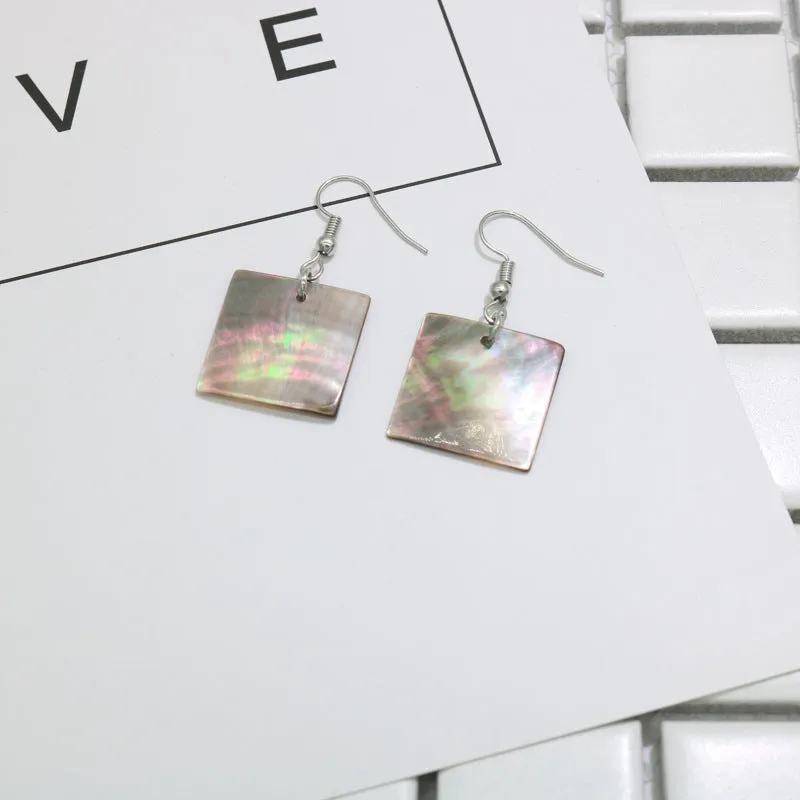 Women's geometric shell earrings showing rectangular and square shapes with natural shell material texture