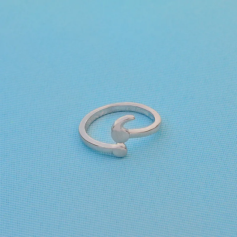 Women's silver-tone alloy ring available in sizes 5 to 10, simple band design