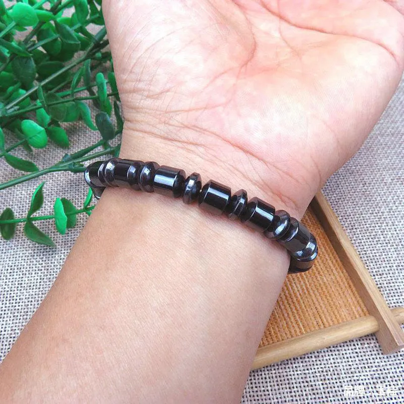 Black stretch magnetic therapy bracelet with pentagram magnetite and hematite stones for women and men