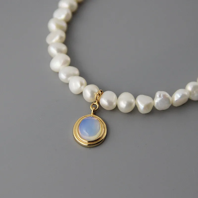 925 silver round medal pearl pendant necklace with irregular pearl geometric design on white background