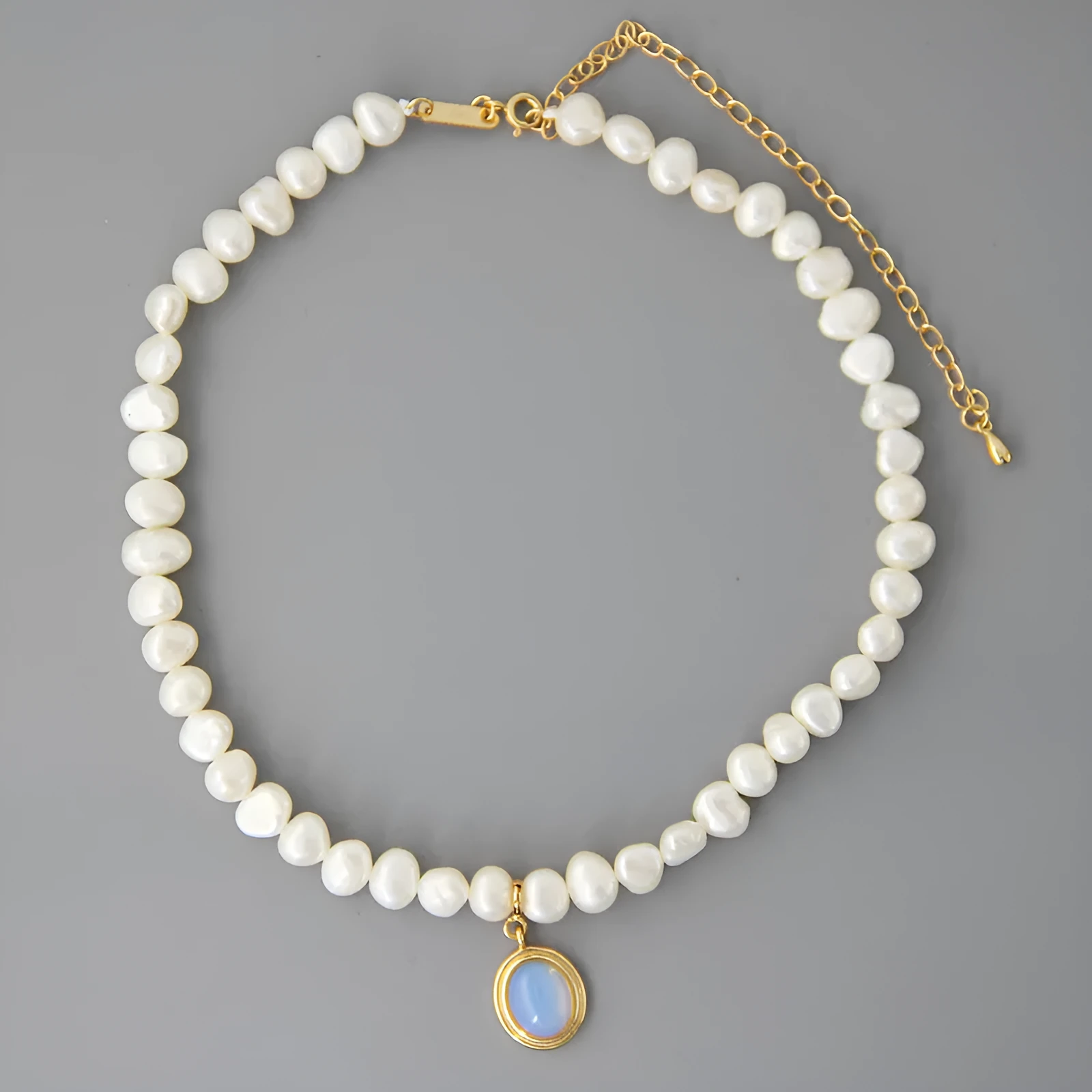 925 silver round medal pearl pendant necklace with irregular pearl geometric design on white background