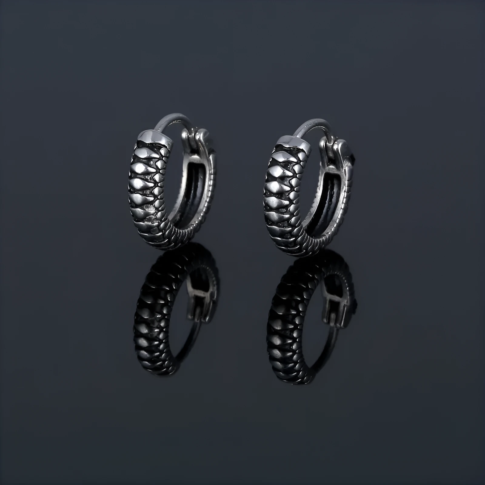 Silver geometric earrings with circular striped design in titanium steel