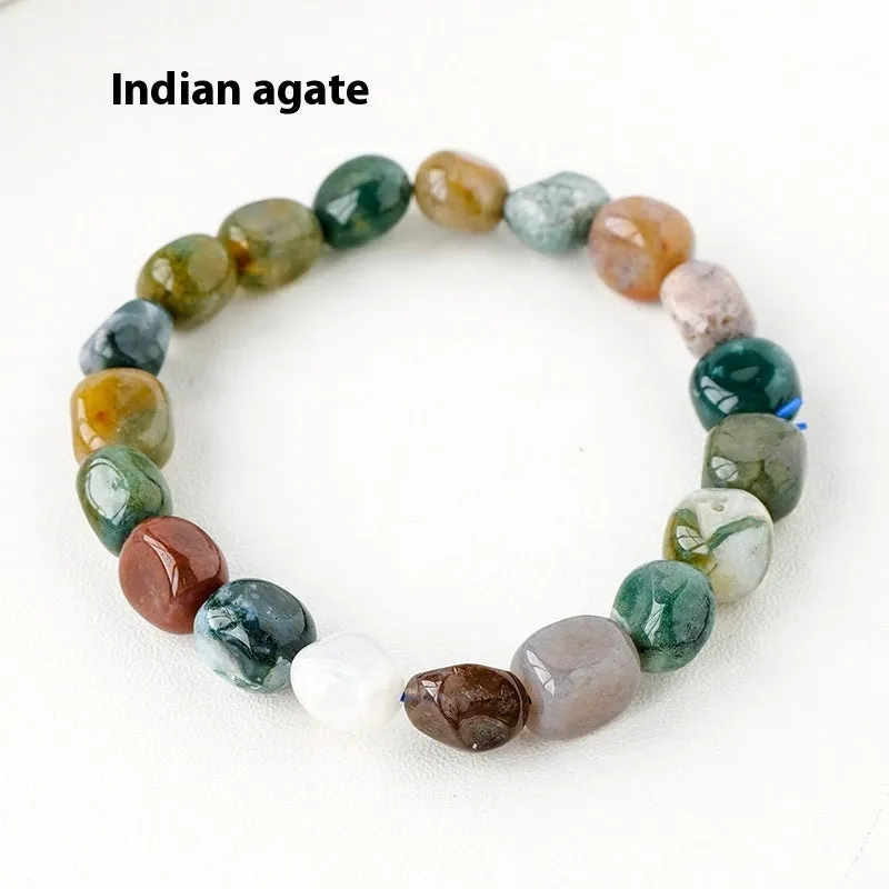 Natural amethyst large particle gravel rolling stone bracelet on a plain background showing smooth rounded beads