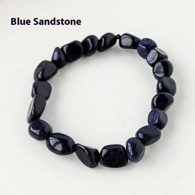 Natural amethyst large particle gravel rolling stone bracelet on a plain background showing smooth rounded beads