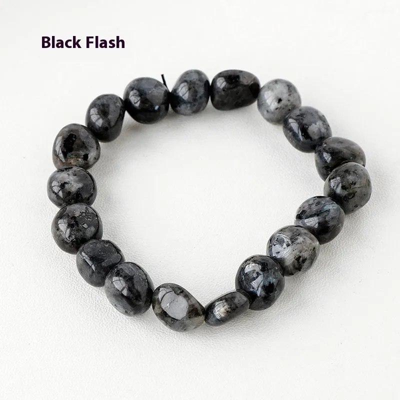 Natural amethyst large particle gravel rolling stone bracelet on a plain background showing smooth rounded beads