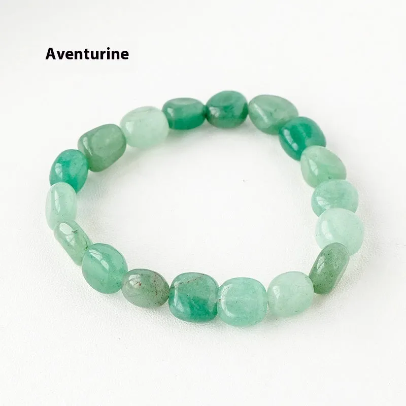 Natural amethyst large particle gravel rolling stone bracelet on a plain background showing smooth rounded beads