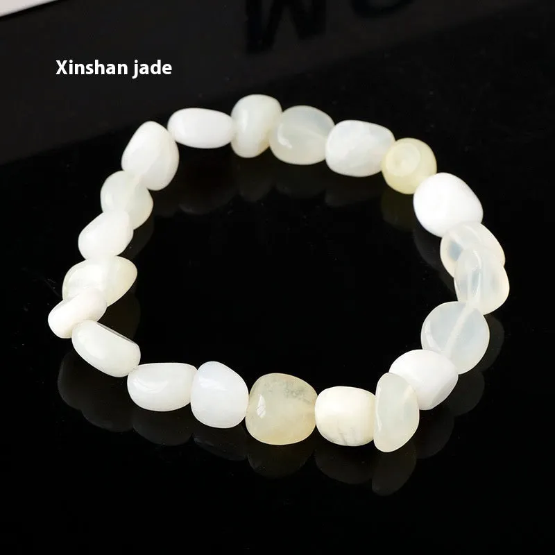 Natural amethyst large particle gravel rolling stone bracelet on a plain background showing smooth rounded beads