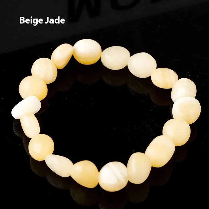 Natural amethyst large particle gravel rolling stone bracelet on a plain background showing smooth rounded beads