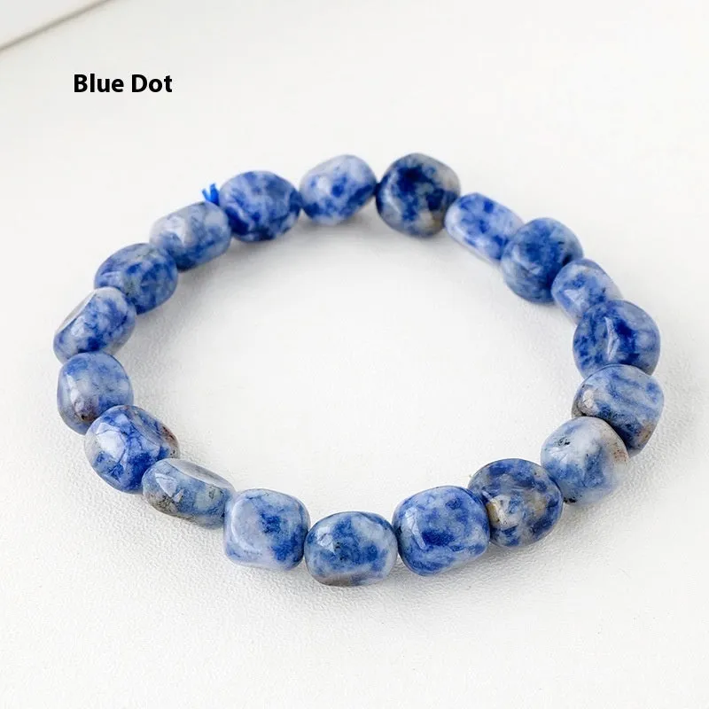 Natural amethyst large particle gravel rolling stone bracelet on a plain background showing smooth rounded beads