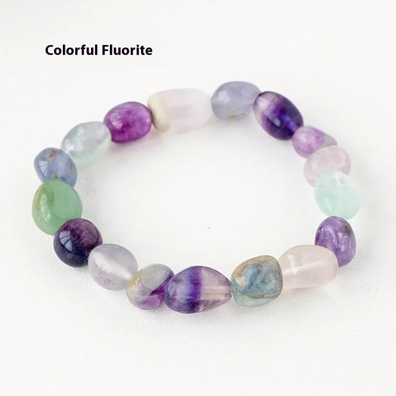 Natural amethyst large particle gravel rolling stone bracelet on a plain background showing smooth rounded beads