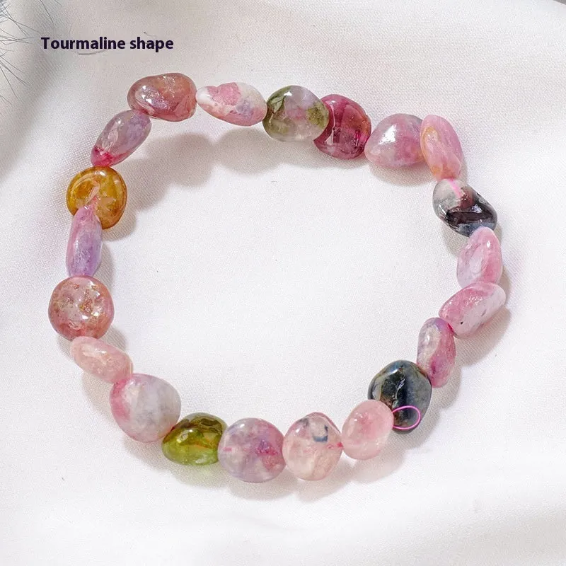 Natural amethyst large particle gravel rolling stone bracelet on a plain background showing smooth rounded beads
