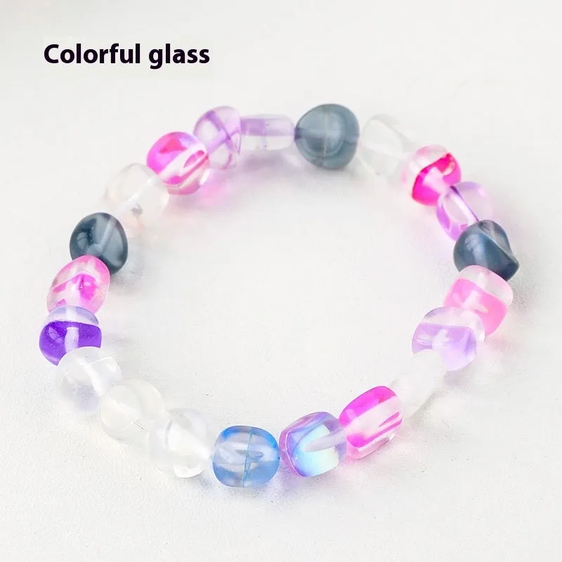 Natural amethyst large particle gravel rolling stone bracelet on a plain background showing smooth rounded beads