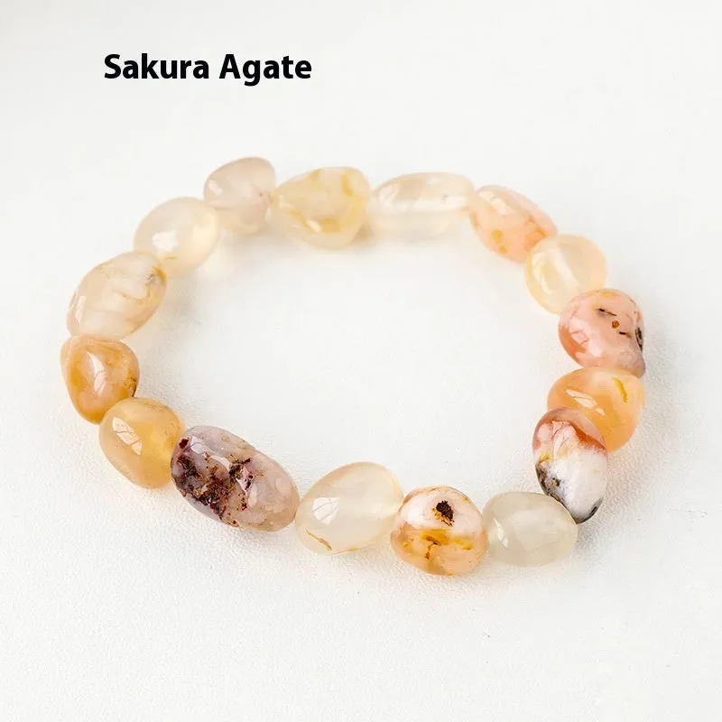 Natural amethyst large particle gravel rolling stone bracelet on a plain background showing smooth rounded beads