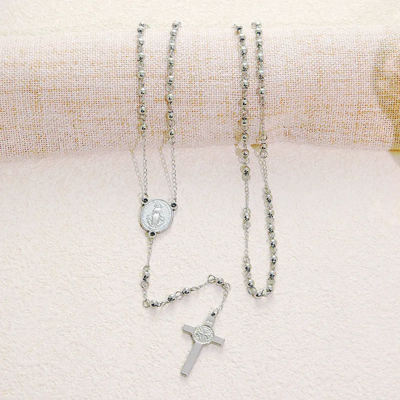 Stainless steel cross pendant necklace in golden colour with a priest pendant design on a simple chain