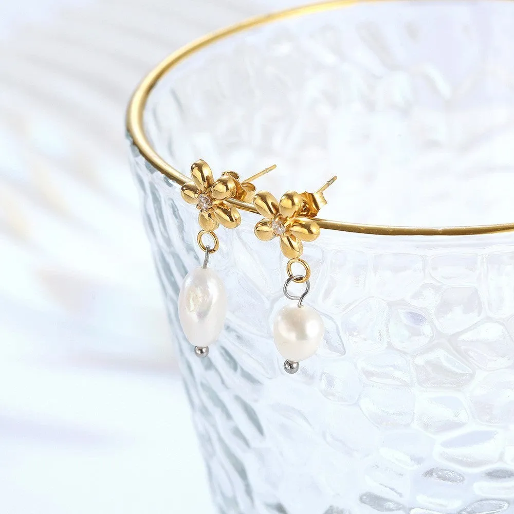 Women's C-shaped titanium steel earrings with pearl inlay flower design in gold