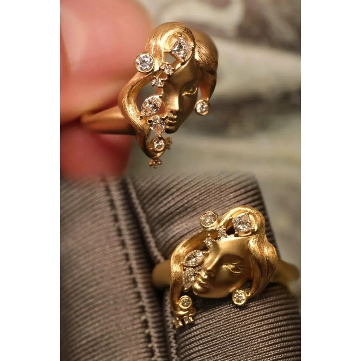 Gold antique portrait creative ring with adjustable opening on display