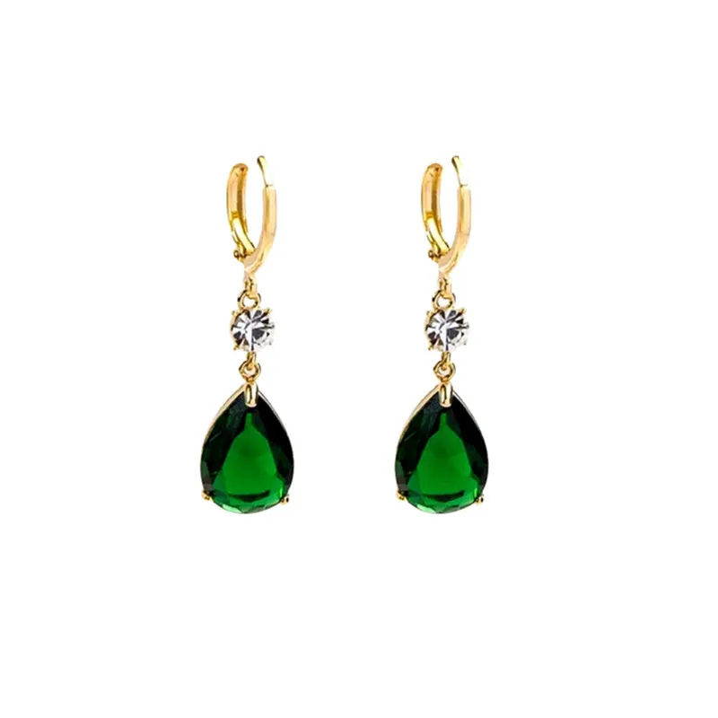 Green geometric teardrop alloy earrings on a white background