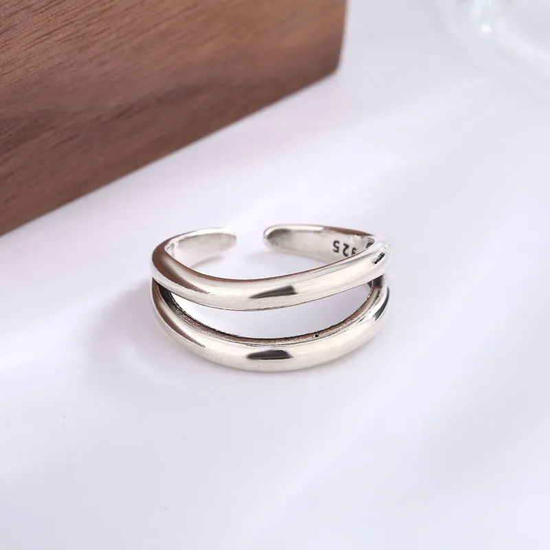Women's retro copper double layer hollow geometry ring with adjustable opening.