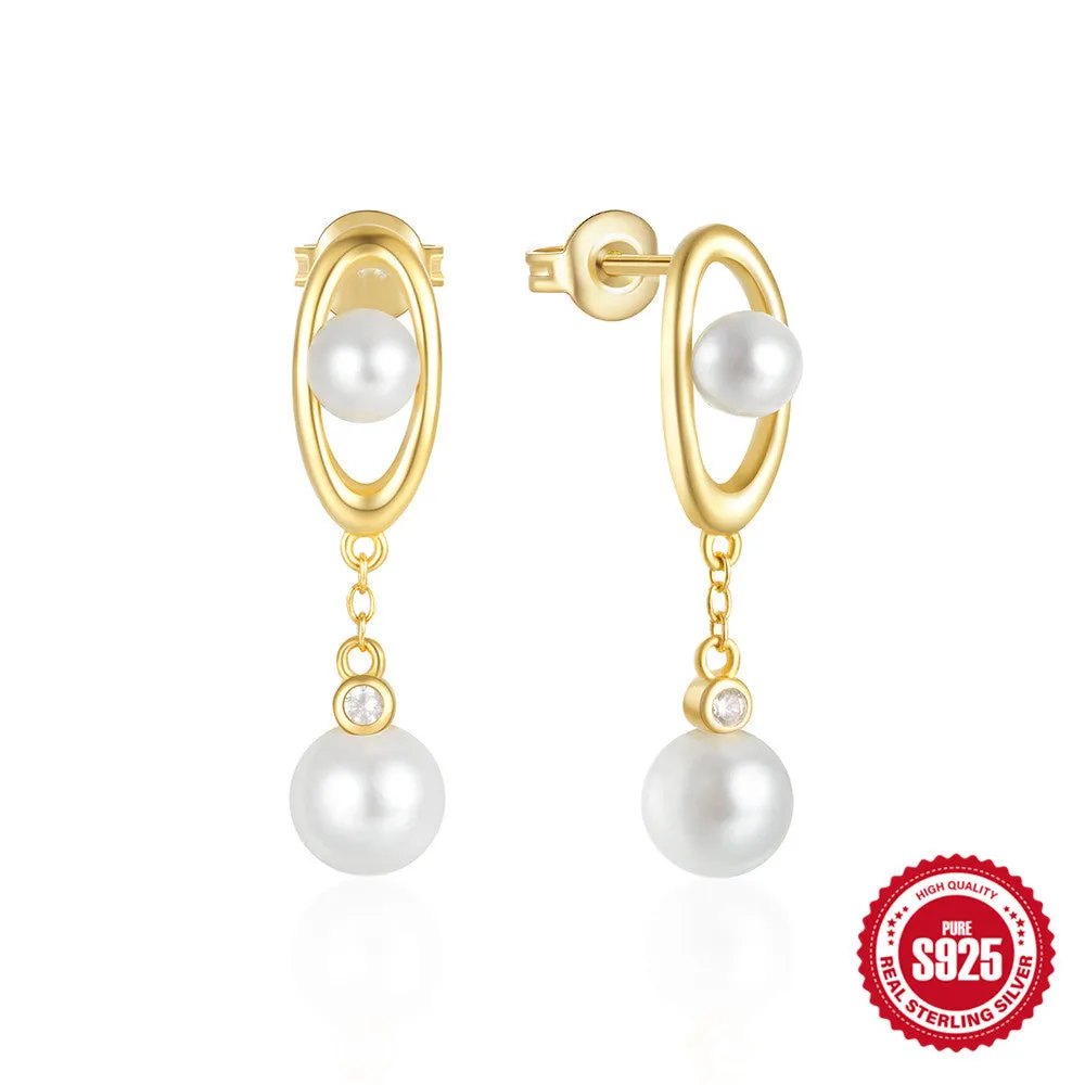Geometric 925 silver stud earrings in gold finish on white background