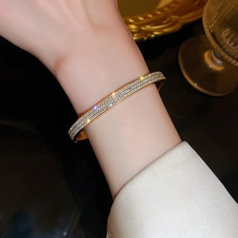 Titanium steel bracelet for women with electroplated non-fading finish and buckle closure in gold colour