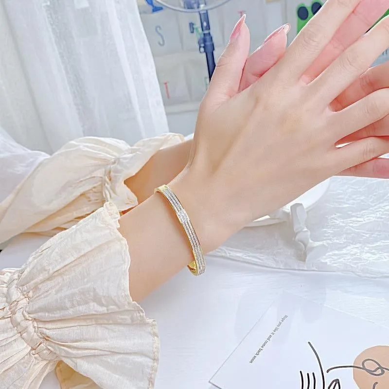 Titanium steel bracelet for women with electroplated non-fading finish and buckle closure in gold colour