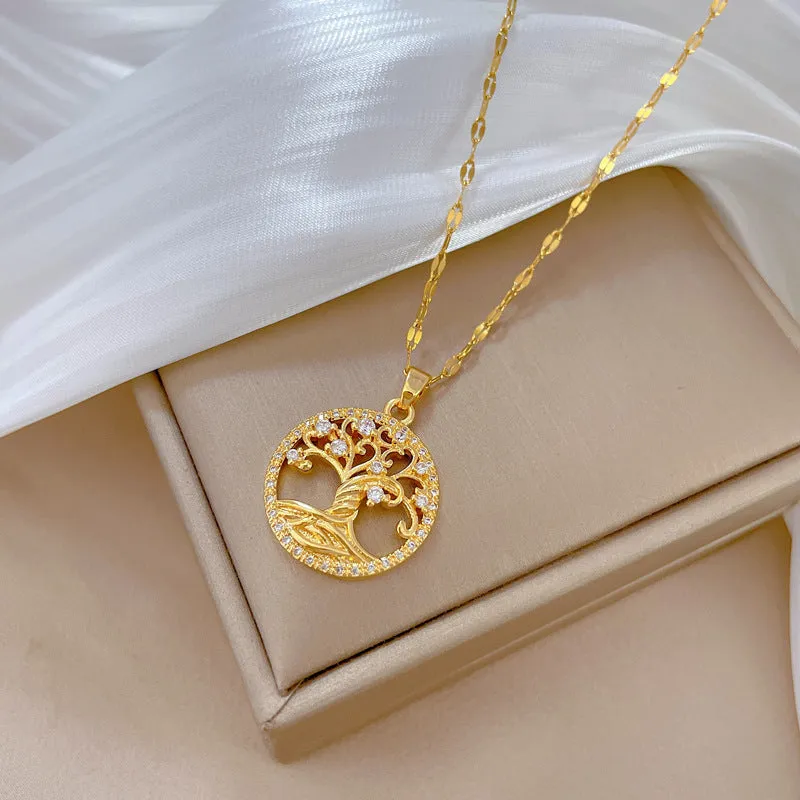 Gold-plated lucky tree pendant necklace with micro-inlaid rhinestones on an adjustable stainless steel chain.