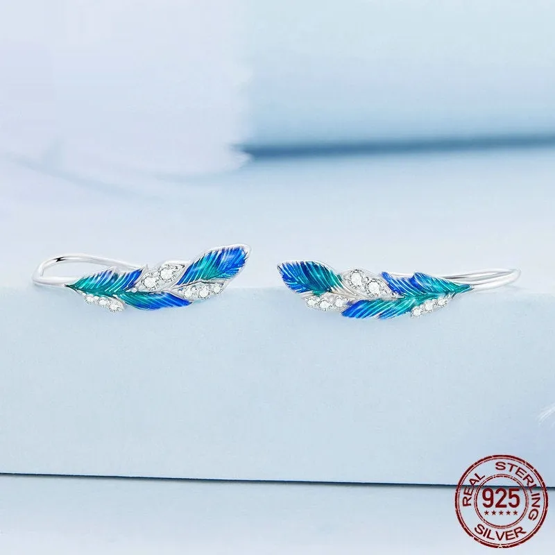 Pair of bright blue gradient feather wing stud earrings white gold plated over 925 silver