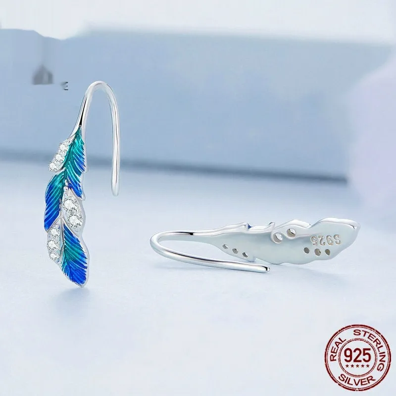 Pair of bright blue gradient feather wing stud earrings white gold plated over 925 silver