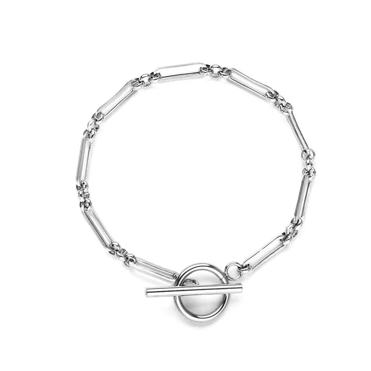 Stainless steel Chopin chain necklace and bracelet set in gold finish on white background