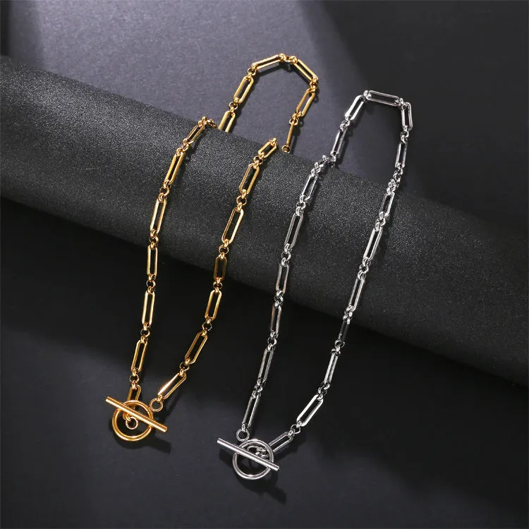 Stainless steel Chopin chain necklace and bracelet set in gold finish on white background