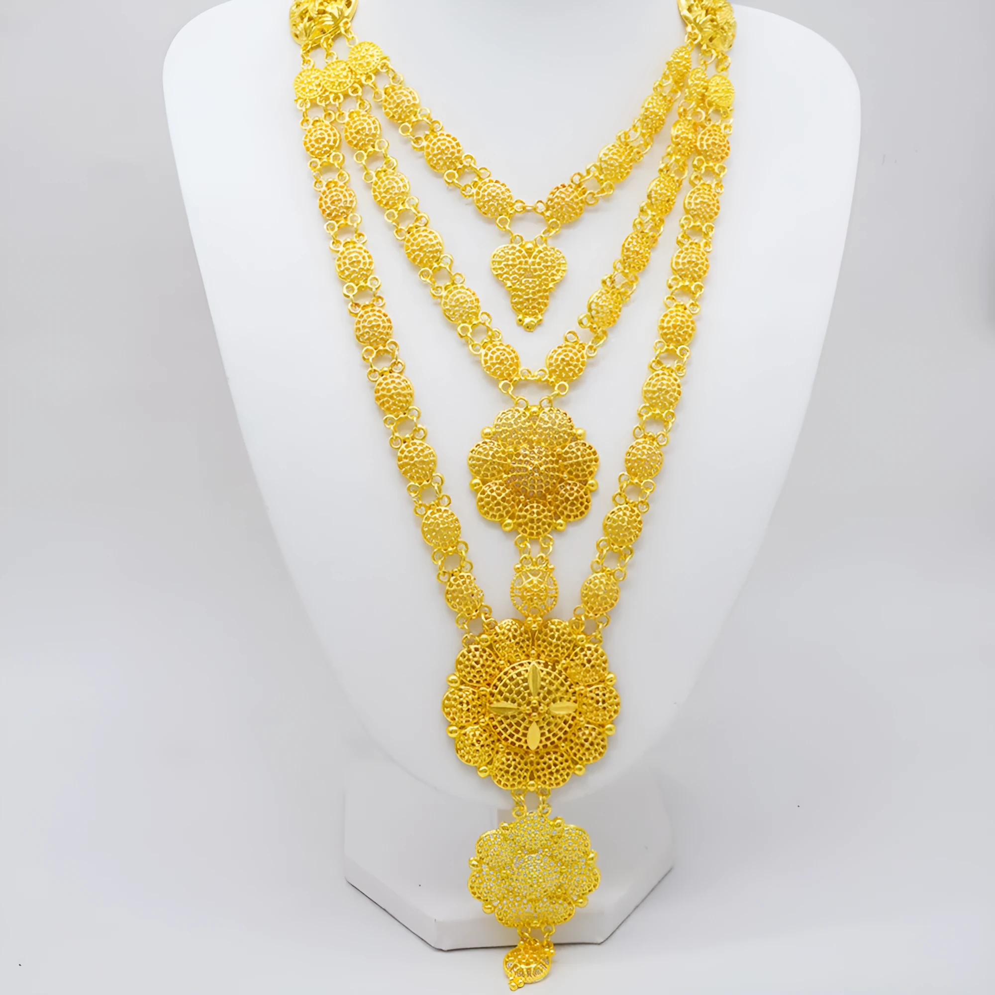 Dubai golden tassel jewellery set including necklace, earrings, bracelet, and ring with water wave chain, alloy construction