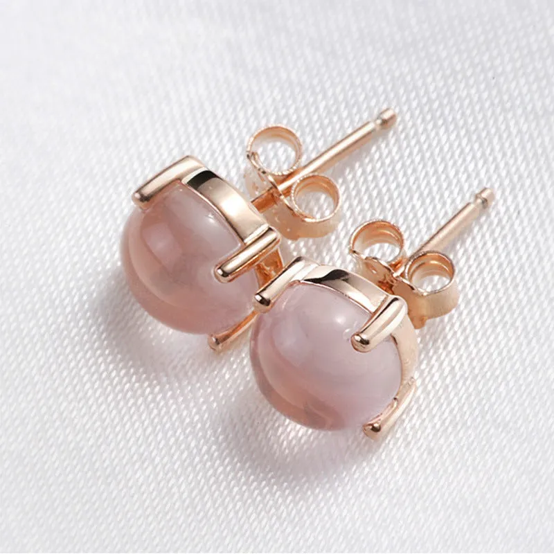 Korean style synthetic ross quartz stud earrings for women with rose gold plating and drop-shaped crystal inlay