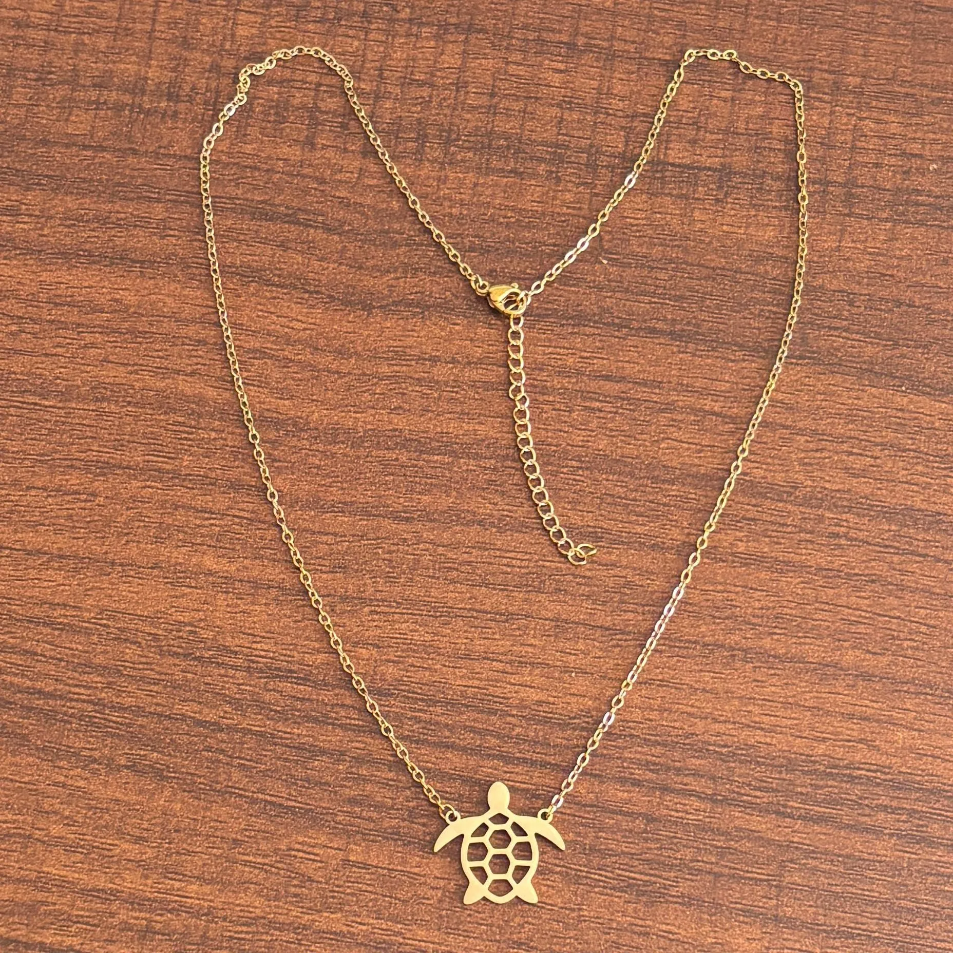 Hollow turtle pendant stainless steel necklace with gold plating and cross-chain style, adjustable 21-50cm