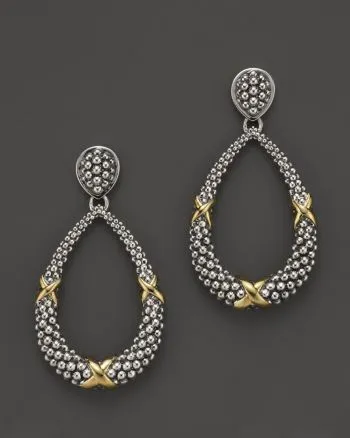 Retro antique silver earrings with animal zodiac motif on silver background