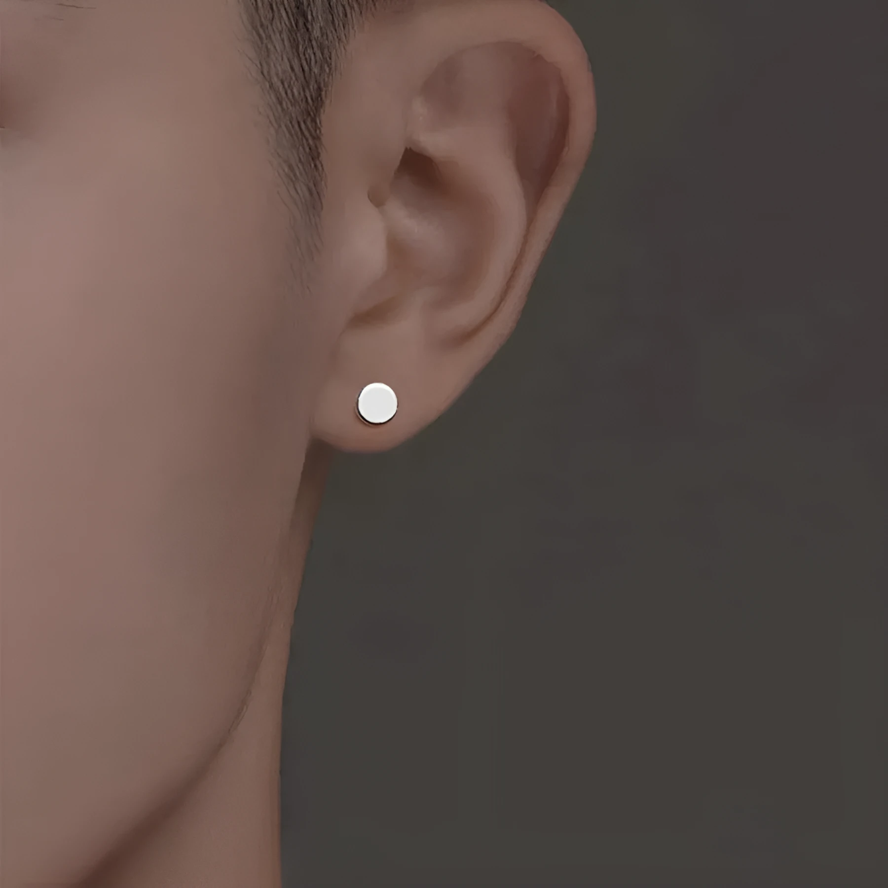 S999 sterling silver flat ear bone studs in geometric round design