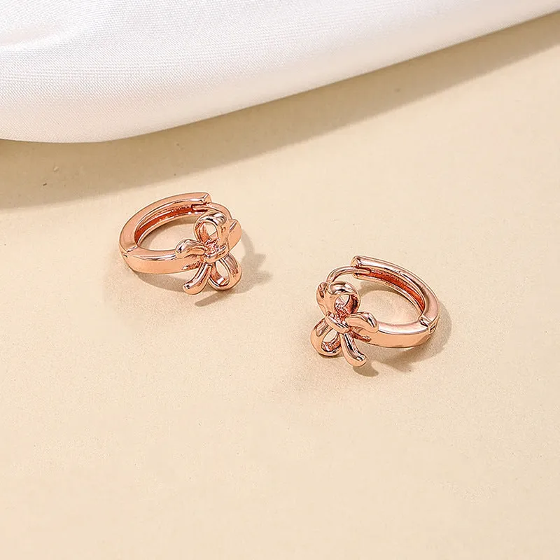 Copper earrings for women with bow and cherry shapes in gold, silver, and rose gold electroplated finishes