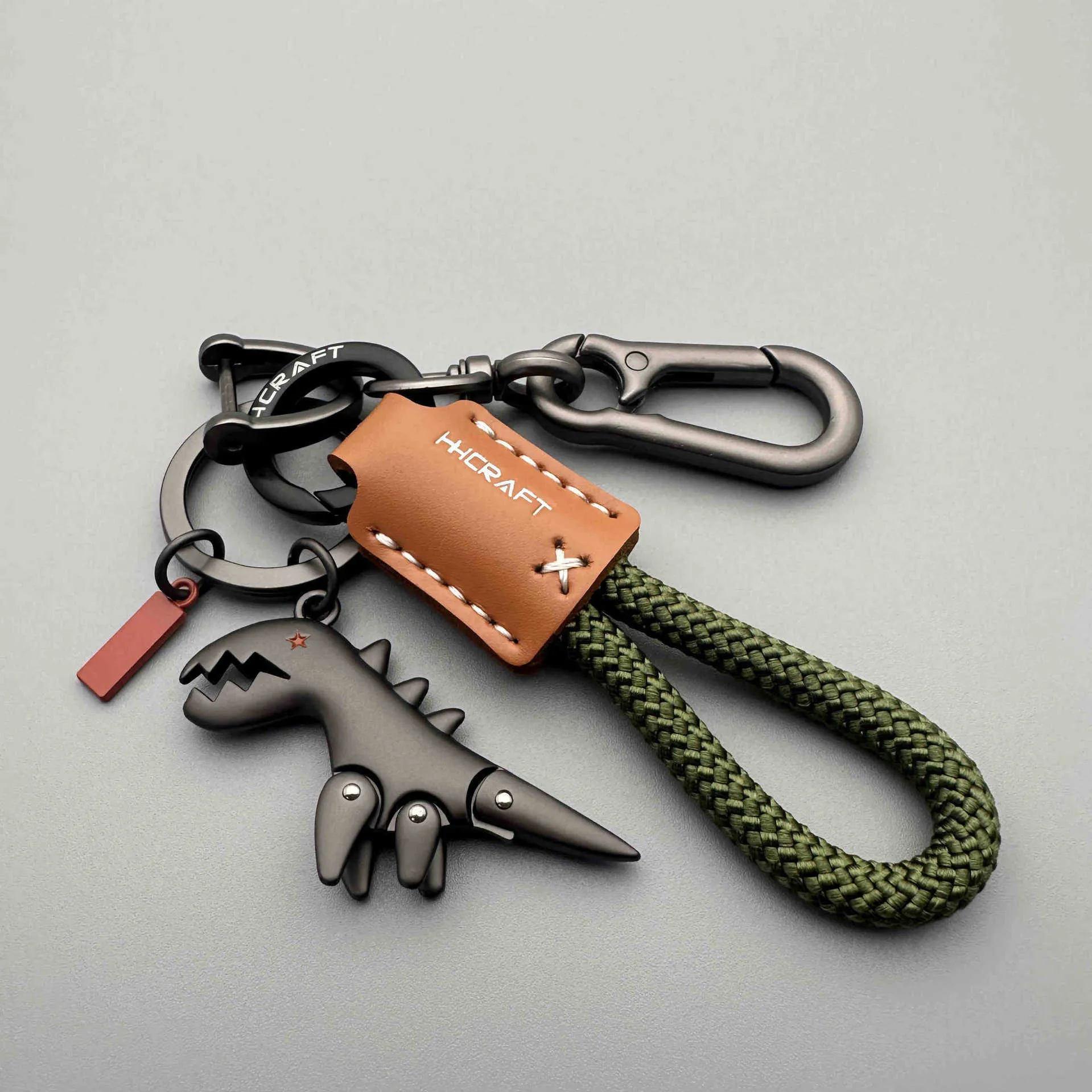 Cute cartoon little dinosaur keychain pendant made of zinc alloy for schoolbag decoration and key identification