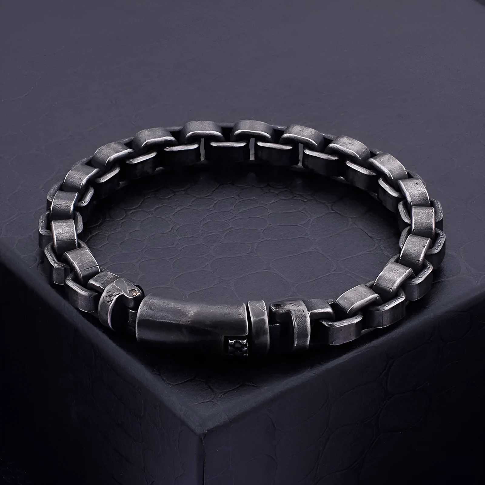 Black titanium steel punk chain bracelet with geometric design, 22cm length, on male wrist
